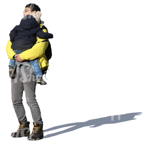 asian man standing and holding his daughter in his arms
