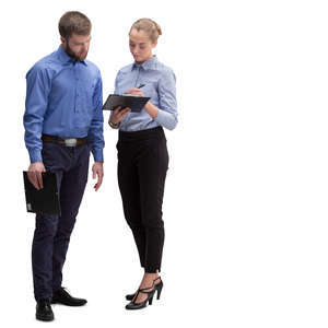 businessman and businesswoman standing and looking at notes