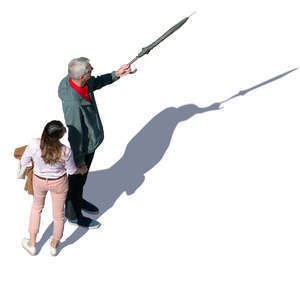 two people standing and pointing seen from above