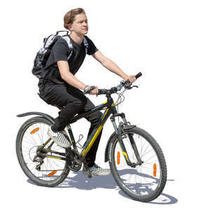 teenage boy riding a bike