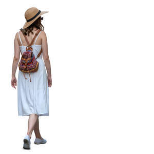 woman in a white summer dress walking