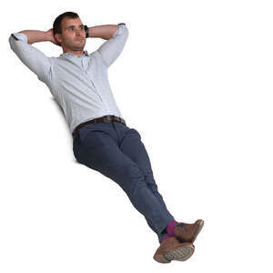 man sitting and leaning comfortably back on the backrest