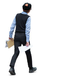 schoolboy in school uniform walking