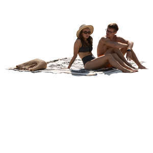 cut out man and woman sitting at the beach and talking