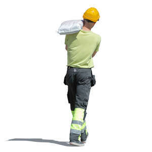 workman carrying a heavey bag