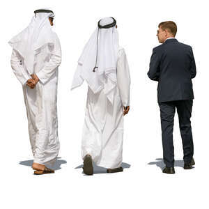 arab men walking and talking to an european businessman