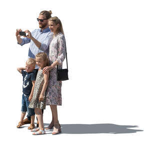 cut out family standing together and taking pictures
