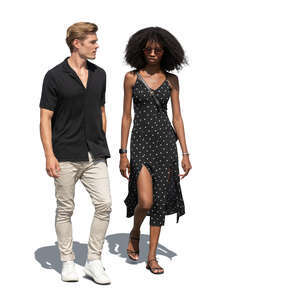 two cut out people walking on the street
