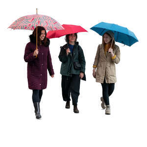three cut out women with umbrellas walking in the rain
