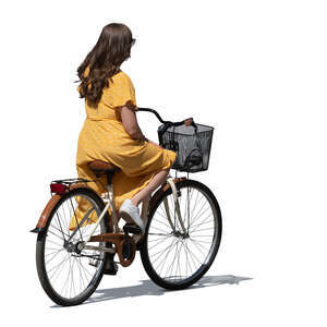cut out young woman in a yellow dress riding a bike