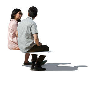 two young asian people sitting