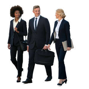 group of three businesspeople walking