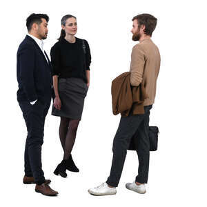 group of three people standing and talking
