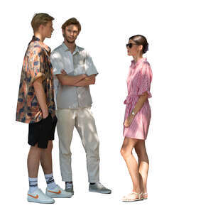 group of three standing in partial sunlight