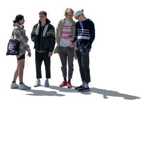 backlit group of teenagers standing