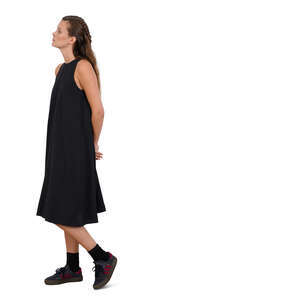 woman in a black dress standing