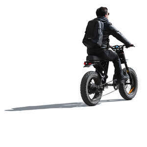 cut out backlit man riding an electric fat bike