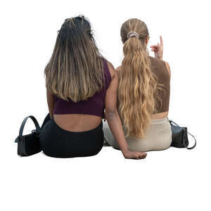 two cut out women sitting seen from back