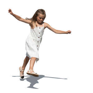 cut out little girl in a white dress playing