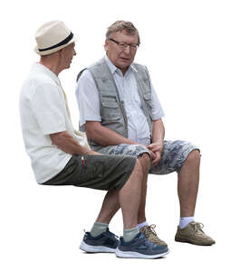 two cut out elderly men sitting and talking