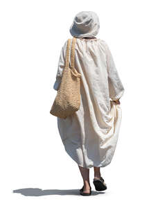 cut out woman in a white tunic walking