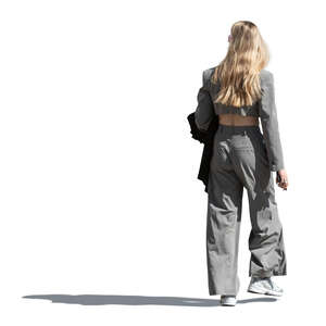 young woman in a casual street style walking