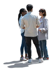 cut out backlit group of friends standing and talking