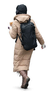 woman in a long puffer coat walking