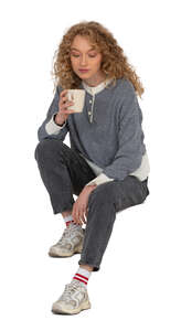 cut out woman sitting on the stairs and drinking coffee
