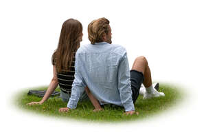cut out couple sitting on the grass
