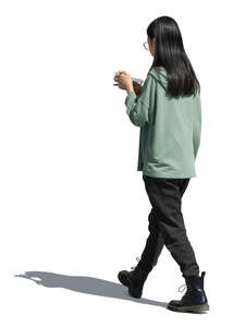 cut out asian woman walking and eating a salad