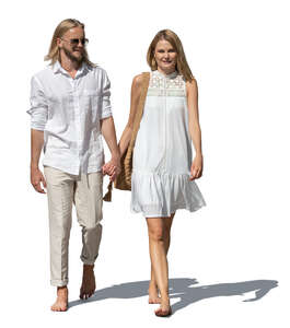 cut out couple in white walking barefoot 