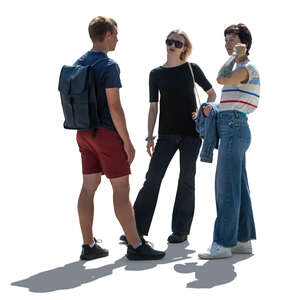 backlit group of friends standing and talking