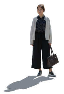 cut out korean woman standing in backlight