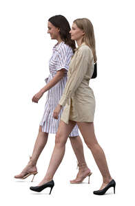 two feminine women with high heels walking side by side