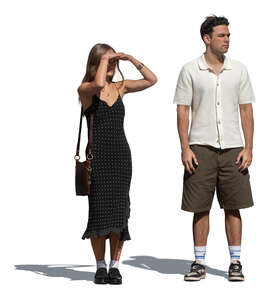 two cut out people standing and looking into distance