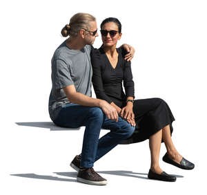 man and woman sitting together