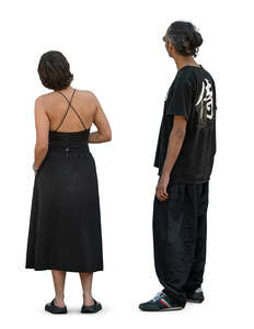 man and woman standing and looking at smth