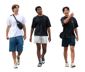 three cut out young men walking in the street