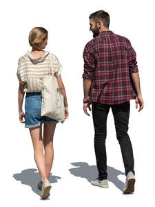 man and woman walking in summer
