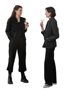 two cut out women standing at a party and drinking wine