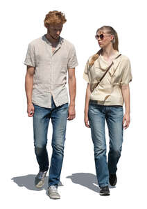 two cut out people walking outside and talking