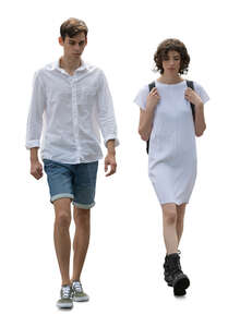 young man and woman in white summer clothes walking