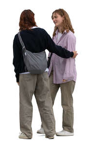 two women standing and talking