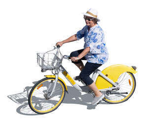 cut out senior woman riding a bike seen from above