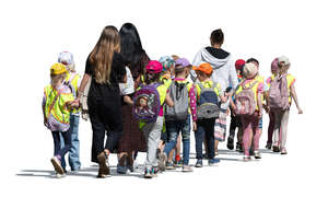 group of kindergarten kids and teachers walking