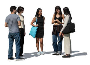 group of people standing together and talking