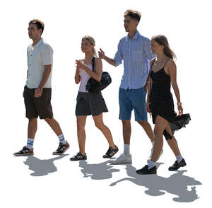 backlit group of teenage boys and girls walking