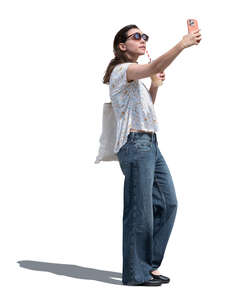 young woman taking a selfie with a coffee drink