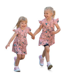 two little girls running happily hand in hand